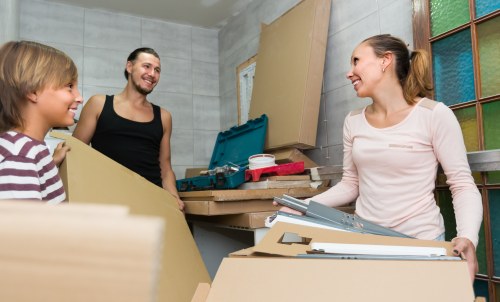 Packed household items ready for urgent transport in Queens Park