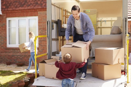 Local movers handling bulky furniture near Queens Park homes