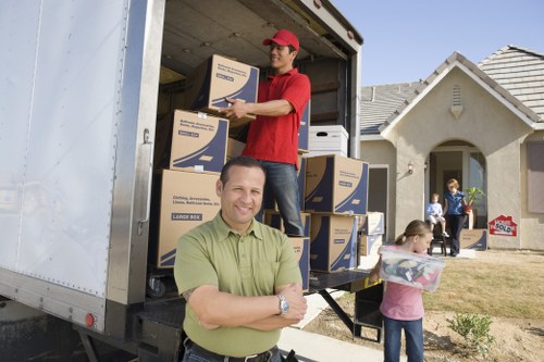 Local office removals team preparing items for transport