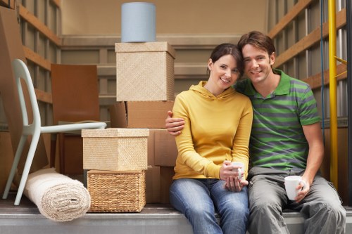 Professional movers handling loading near Queens Park flats and terraces
