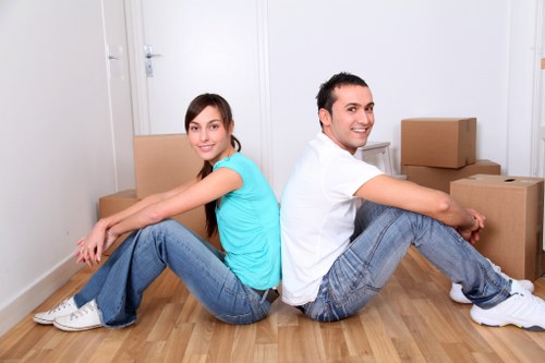 Queenspark man and van transporting boxes and household items
